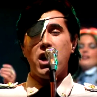 How did Bryan Ferry sustain facial injuries leading to the eye patch