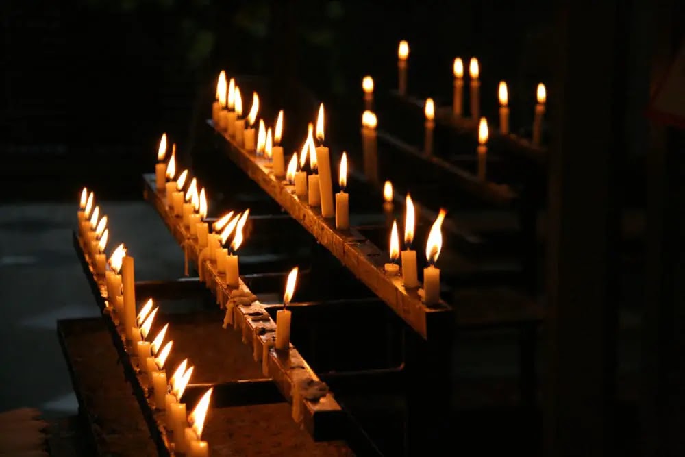 The potential significance of flickering candles in superstitions and spiritual beliefs