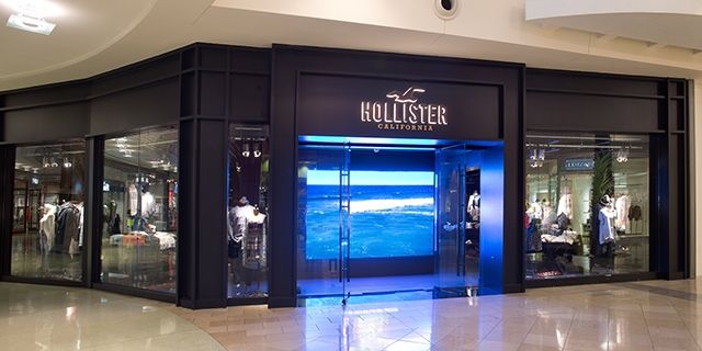 What makes Hollister a popular clothing brand in the UK
